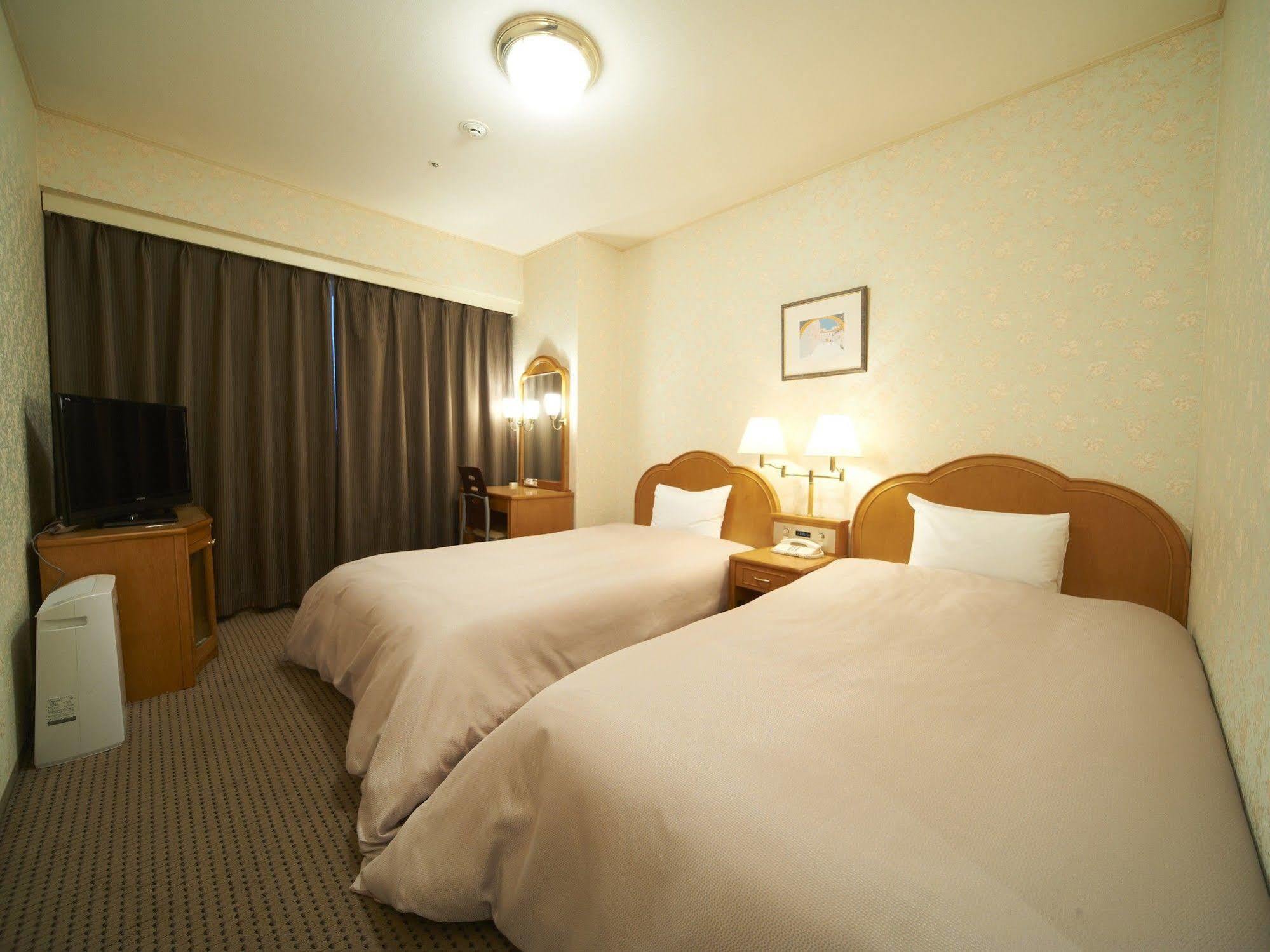 Hotel Sunroute Sopra Kobe Bagian luar foto
